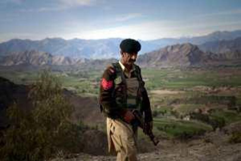 Despite having over two thosand regular troops already deployed along it's 200km border with Afghanistan's Helmand province, Pakistani officials are still concerned over the influx of American soldiers into the area, fearing the surge will drive Taliban militants over the border into already troubled Baluchistan... 

A Pakistani Frontier Corp soldier holds his weapon as he walks along a road ain the Kandaro Valley at the Mohmand Tribal Area, Pakistan, Saturday, Feb.28, 2009. Analysts said the six-month offensive had undoubtedly driven back the militants from towns and major roads in the remote, tribally ruled regions that border Afghanistan, while the United States said last year it had helped cut down the numbers of fighters traveling into Afghanistan to attack American and NATO troops. (AP Photo/Emilio Morenatti)