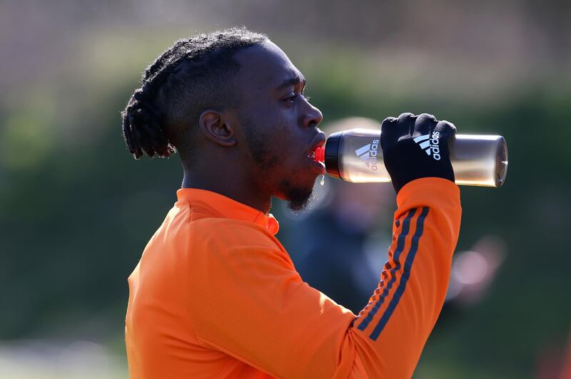 MANCHESTER, ENGLAND - APRIL 02:   Aaron Wan-Bissaka of Manchester United has a drink during a first team training session at Aon Training Complex on April 2, 2021 in Manchester, England. (Photo by Matthew Peters/Manchester United via Getty Images)