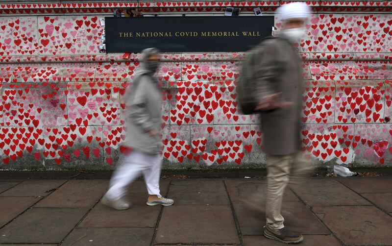 The Covid-19 Memorial Wall in London, which has more than 150,000 hearts painted on it. EPA