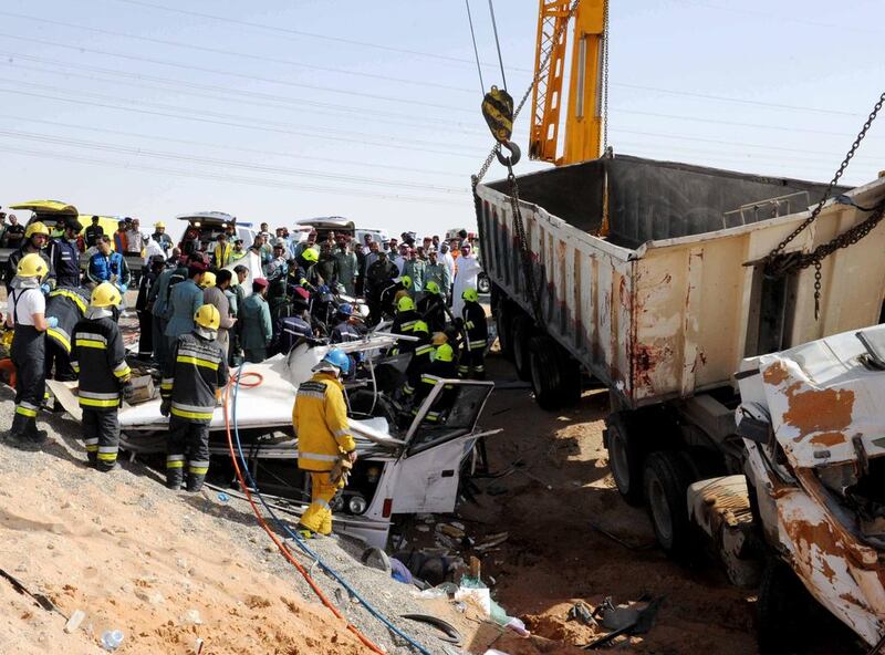 Twenty one people died when a lorry ploughed into the back of a bus carrying 45 workers on the E30 old truck road beside the Al Rawda Palace on the outskirts of Al Ain. Courtesy Al Ain Police