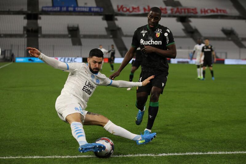 Marseille's Morgan Sanson attempts to keep the ball in play. AP