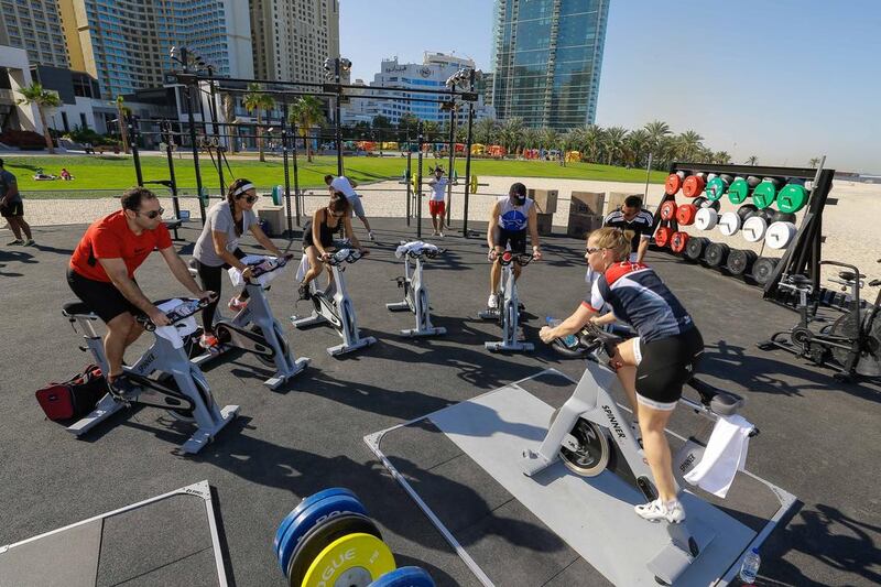 A spinning class at the new outdoor gym at The Beach in Jumeirah Beach Residence. Victor Besa for The National