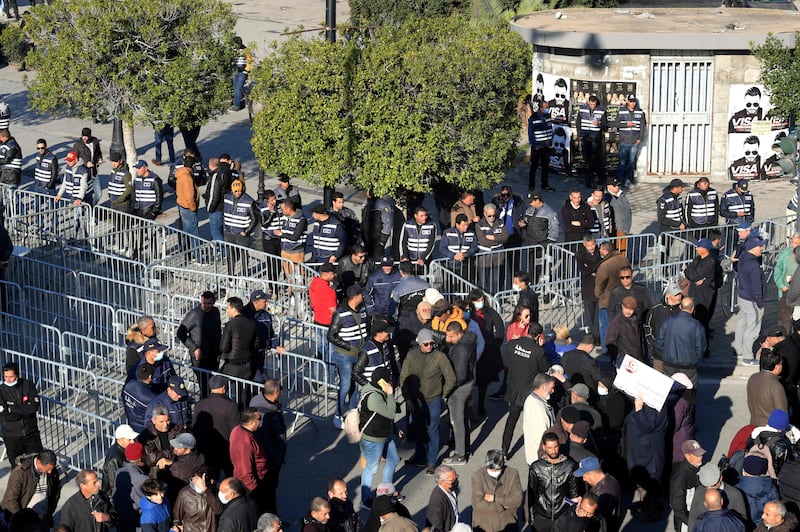 Tunisian police block the entrances to the city centre at a protest against President Kais Saied in Tunis. AFP