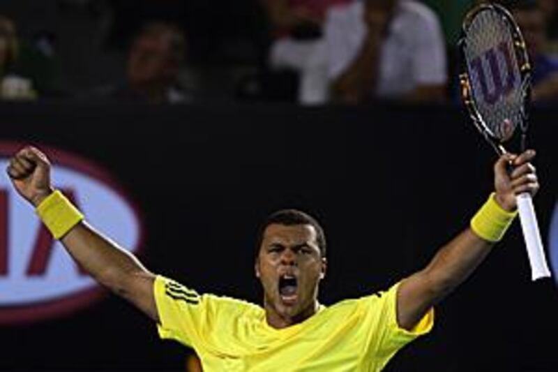 Jo Wilfried-Tsonga celebrates after securing his blistering victory over the American James Blake in the fourth round of the Australian Open.