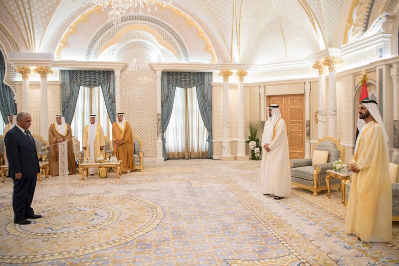 ABU DHABI, UNITED ARAB EMIRATES - September 18, 2018: HH Sheikh Mohamed bin Zayed Al Nahyan Crown Prince of Abu Dhabi Deputy Supreme Commander of the UAE Armed Forces (2nd R) and HH Sheikh Mohamed bin Rashid Al Maktoum, Vice-President, Prime Minister of the UAE, Ruler of Dubai and Minister of Defence (R), witness the oath of Judge Sabri Shams Aldeen Mohamed (L), attend the swearing-in ceremony for a minister and judges of the United Arab Emirates, held at Presidential Palace.?

( Saeed Al Neyadi / Crown Prince Court - Abu Dhabi )
---