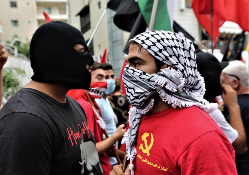 Protesters backed by Hezbollah, the Lebanese communist party and others during a demonstration against the United States' interference in Lebanon's affairs, near the US embassy in Awkar area, Beirut, Lebanon. EPA