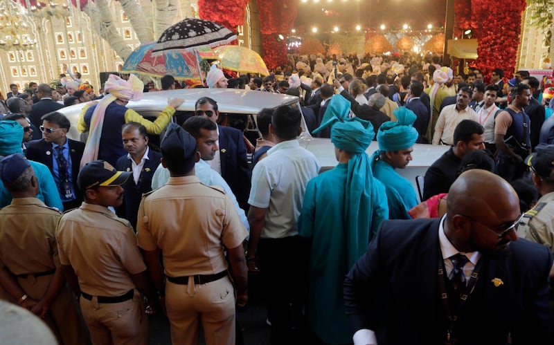 The car carrying the groom, Anand Piramal, arrives at the venue. AP Photo