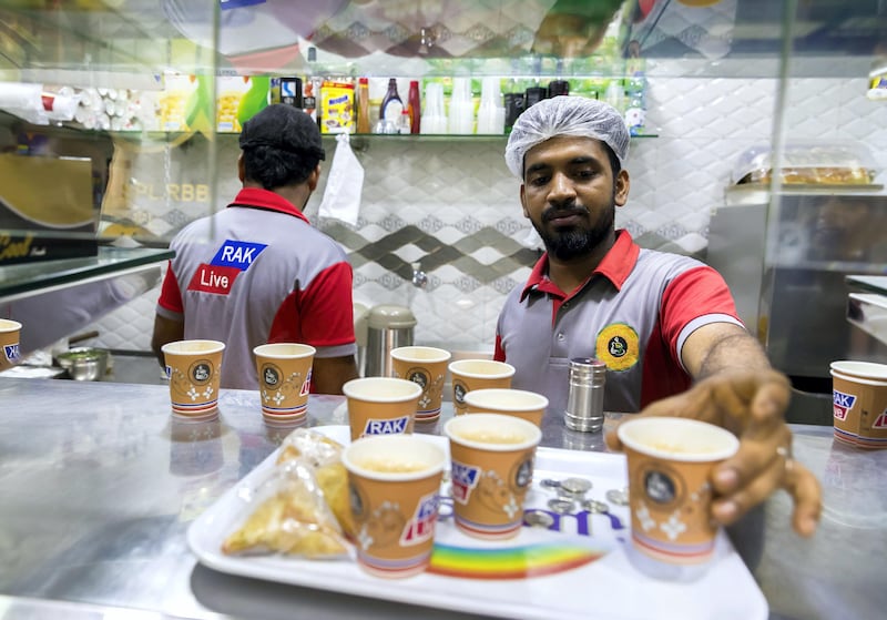 Ras Al Khaimah, United Arab Emirates - September 20th, 2017: Workers at Nena Tea. A traditional fishing neighbourhood in Old RAK has been transformed by karak coffee and tea shops that have popped up in the last two years. Wednesday, September 20th, 2017, Old RAK, Ras Al Khaimah. Chris Whiteoak / The National