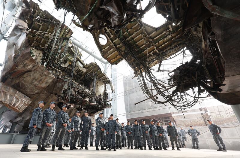 South Korean sailors gather at the wreckage of the Cheonan warship, which was sunk by a North Korean torpedo in 2010, killing 46, at a naval base in Pyeongtaek, south of Seoul. EPA 