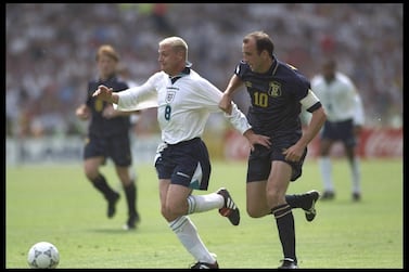 England's Paul Gascoigne is chased by Scotland's Gary McAllister at Euro 96. Getty