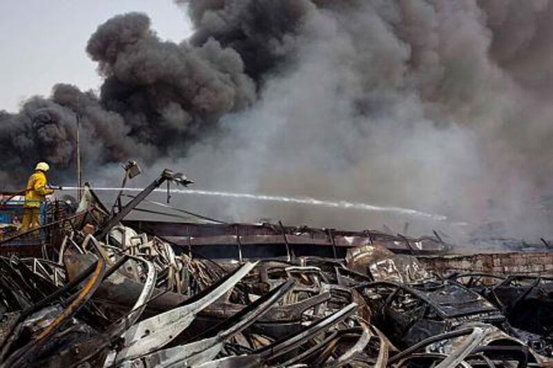 â€œThe presence of cars with oil as well as the burning of tyres escalated the blaze and facilitated it quickly spreading to neighbouring warehouses,â€� said Col Rashid Al Marri of Sharjah Civil Defence. Antonie Robertson / The National
