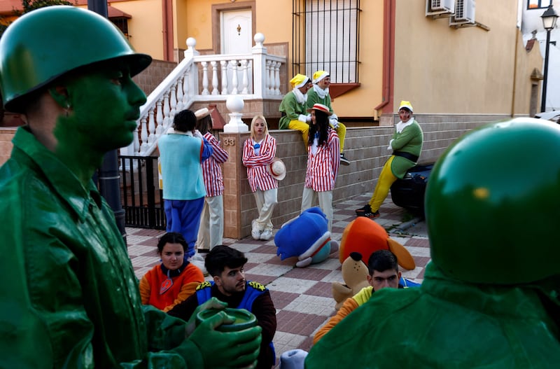 People wait to participate in the traditional Epiphany parade, in Ronda, Spain. Reuters