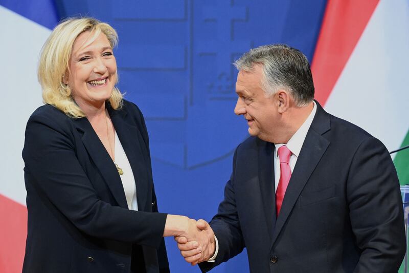 Marine Le Pen with Hungarian Prime Minister Viktor Orban in Budapest. AFP