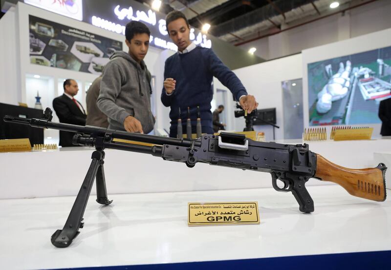 A visitor shows a GPMG at the Egyptian stand during the last day of Egypt Defence Expo, showcasing military systems and hardware, in Cairo, Egypt. Reuters