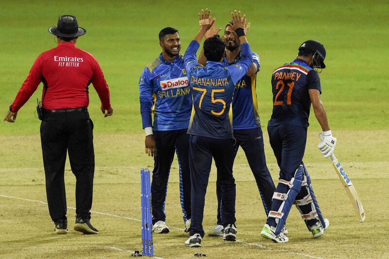 Sri Lanka captain Dasun Shanaka celebrates with his teammates after the dismissal India's Manish Pandey.
