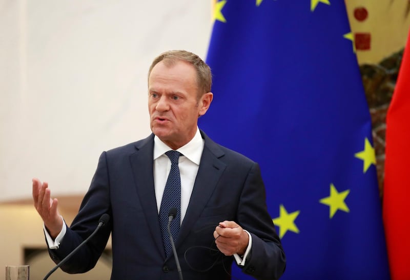 epa06892353 European Council President Donald Tusk speaks to reporters during a press conference at the 20th European Union EU-China Summit at the Great Hall of the People in Beijing, China, 16 July 2018. Leaders of the European Union (EU) and China meet in Beijing on 16 July for their annual EU-China summit to discuss global and bilateral trade and investment relations.  EPA/HOW HWEE YOUNG