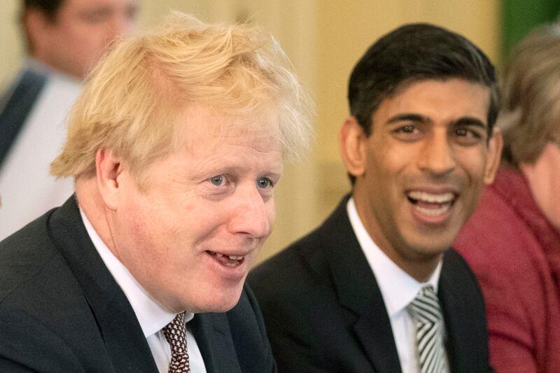 With Mr Johnson at his first Cabinet meeting after a reshuffle at 10 Downing Street in February 2020. Getty Images