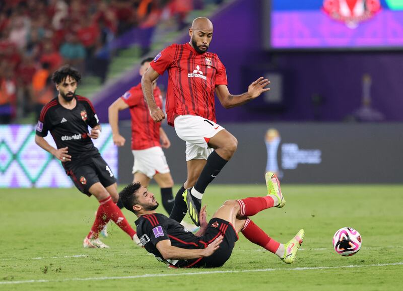 Urawa Red Diamonds' Jose Kante in action with Al Ahly's Mohamed Abdelmonem. Reuters 