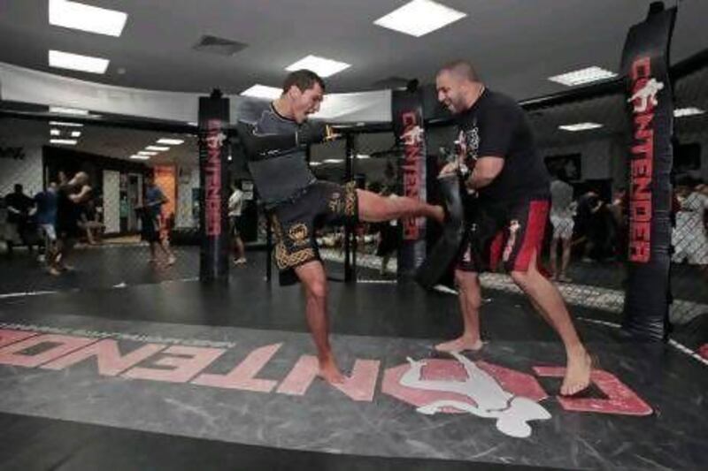 Malik Omarov trains with Tam Khan at Contender MMA in Dubai. Jeffrey E Biteng / The National