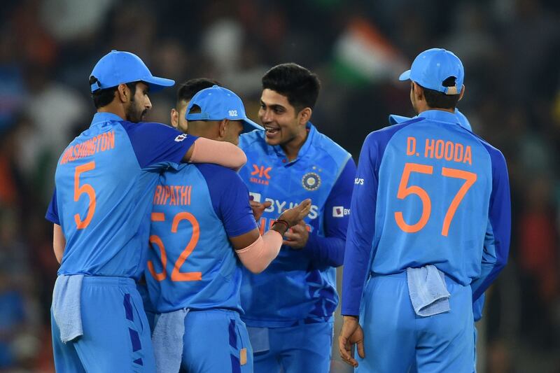 India's players celebrate after the dismissal of New Zealand's Ish Sodhi. AFP