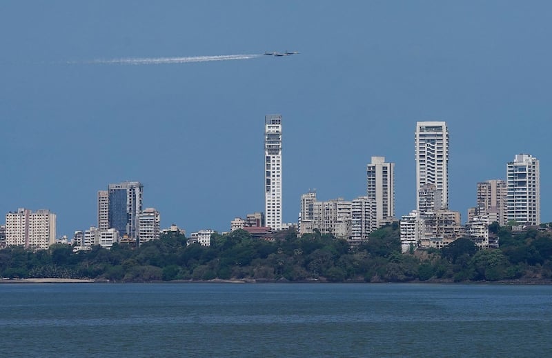 Indian Air Force Sukhoi fighter jets fly past Marine Drive in Mumbai. Reuters