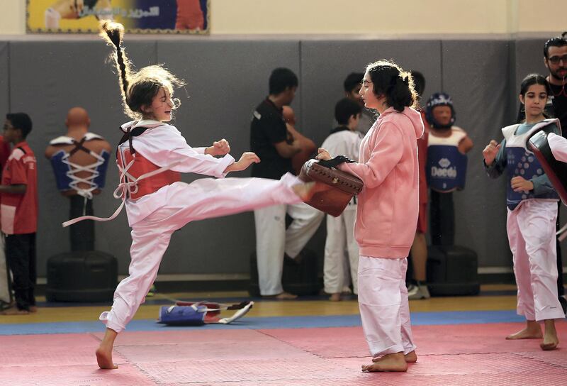 FUJAIRAH , UNITED ARAB EMIRATES , JUNE 04 – 2018 :- Students during the Taekwondo training class organised by Fujairah Martial Arts club held at Asem bin Thabit Secondary School for Boys in Fujariah.  ( Pawan Singh / The National )  For News. Story by Ruba Haza