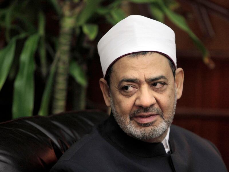 FILE - In this Aug. 8, 2011 file photo, Ahmed al-Tayeb, Grand Sheikh of Al-Azhar, Egypt's top Muslim cleric, meets with Egyptian presidential candidate Mohamed El Baradei, in Cairo, Egypt. Al-Tayeb has stirred up controversy after saying that polygamy is an "injustice" for women. His comments, aired Friday, Feb. 1, 2019, on state TV said "those who say that marriage must be polygamous are all wrong." He said polygamy is restricted in Islam and requires fairness. (AP Photo/Amr Nabil, File)