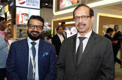 Saleem VI, chief operation office of the Lulu Group, left, with Salim MA, the company's director, at Gulfood on Monday. Pawan Singh / The National 