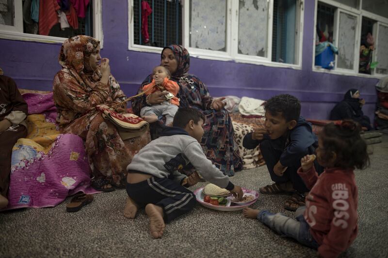 Internally displaced Palestinians take shelter at a UN school in Khan Younis, southern Gaza. EPA