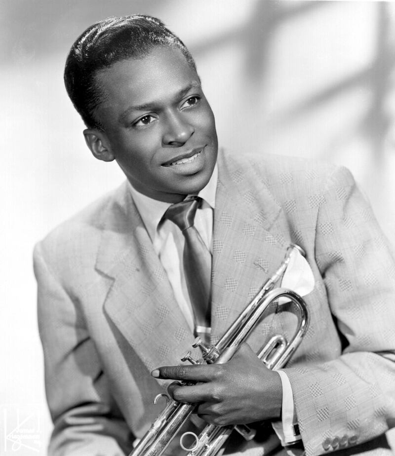 NEW YORK - 1948:  Jazz trumpeter Miles Davis poses for a portrait early in his career holding his horn in 1948 in New York City, New York. (Photo by Michael Ochs Archives/Getty Images)