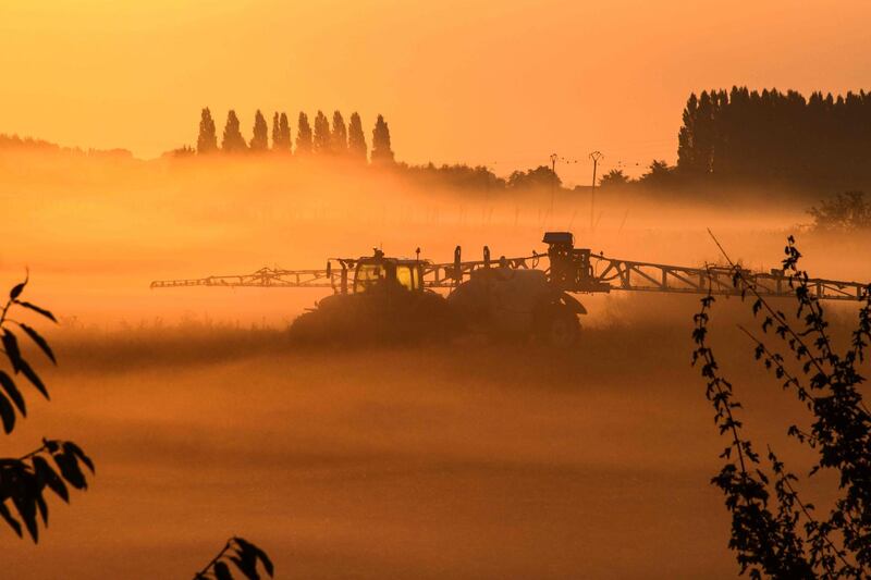 A farmer sprays products in a field near Lille, northern France.  Denis Charlet / AFP