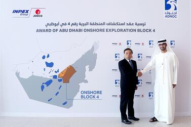 Mr Ueda, left at the signing ceremony with Dr Al Jaber. The Japanese firm won a 35-year exploration rights to the block, which straddles Abu Dhabi’s border with Dubai.  Courtsey: Adnoc