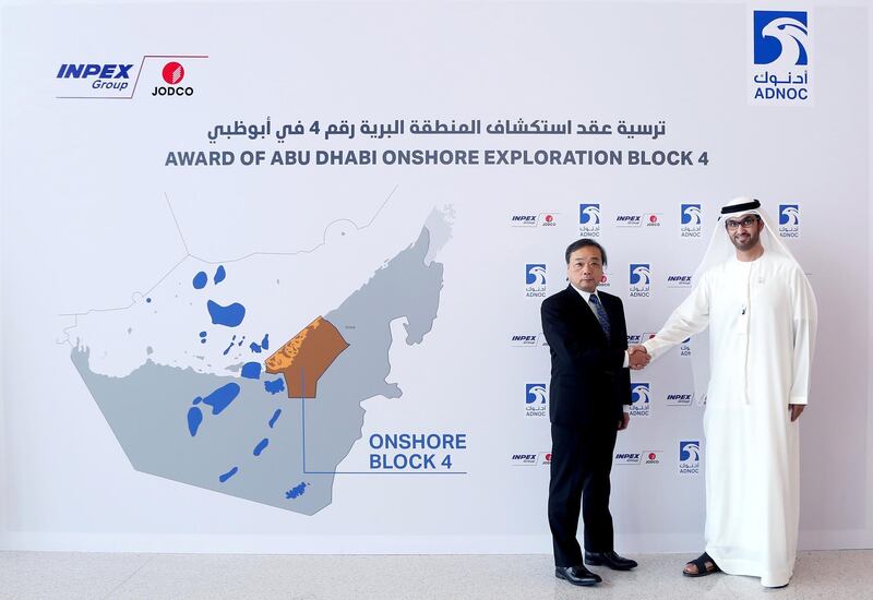 Dr. Sultan Ahmed Al Jaber, UAE Minister of State and ADNOC Group CEO, and Takayuki Ueda, President and CEO of INPEX CORPORATION shake ahnds after signiing an agreement. courstey ADNOC
