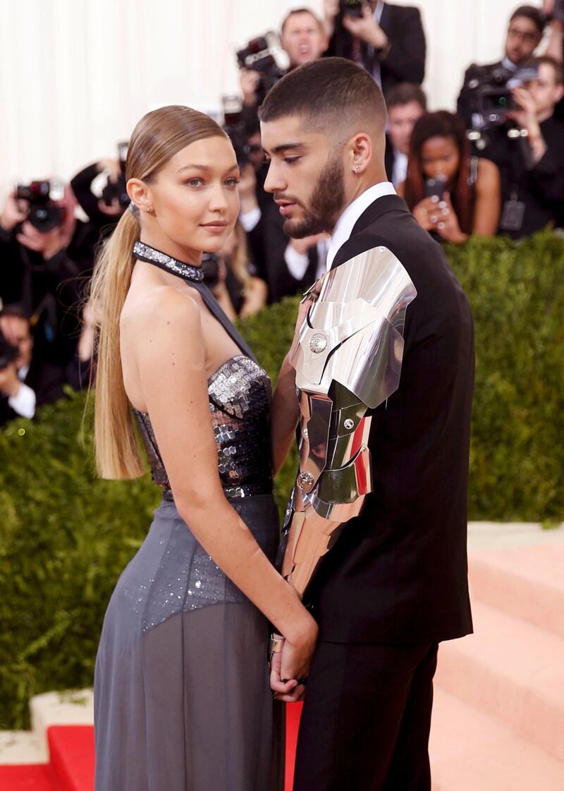 FILE PHOTO: Model Gigi Hadid (L) and singer Zayn Malik arrive at the Metropolitan Museum of Art Costume Institute Gala (Met Gala) to celebrate the opening of "Manus x Machina: Fashion in an Age of Technology" in the Manhattan borough of New York, May 2, 2016. REUTERS/Eduardo Munoz/File Photo