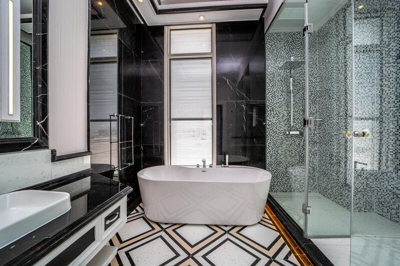 The bathrooms have a contemporary design. Courtesy LuxuryProperty.com