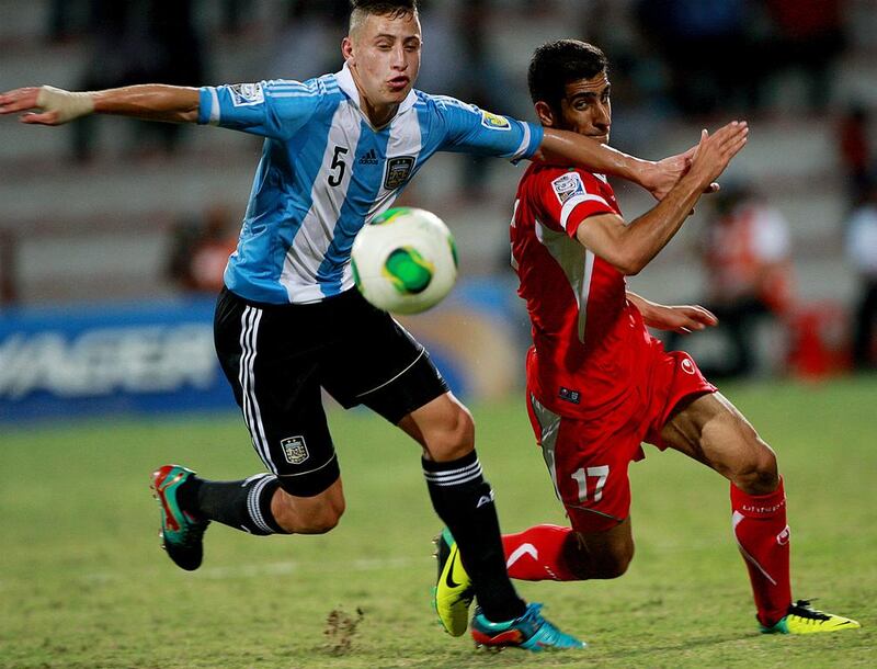 Both Argentina, in blue and white, and Iraq did not disappoint and the 1-1 result looked a fair one. Satish Kumar / The National