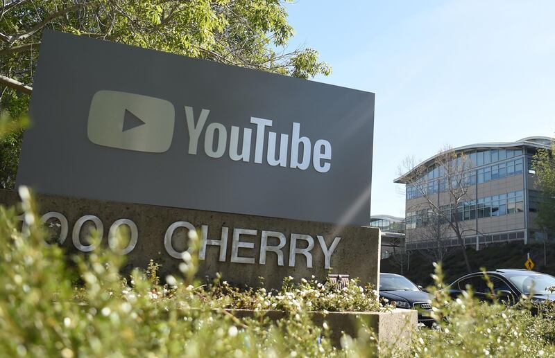 (FILES) In this file photo taken on April 3, 2018, a YouTube sign is seen at YouTube's corporate headquarters  in San Bruno, California.                       YouTube broadened its anti-harassment policies on December 11, 2019, to include a ban on "implied" threats along with insults based on race, gender identity or sexual orientation. "We will no longer allow content that maliciously insults someone based on protected attributes such as their race, gender expression, or sexual orientation," global head of trust and safety Matt Halprin said in an online post. - 
 / AFP / JOSH EDELSON

