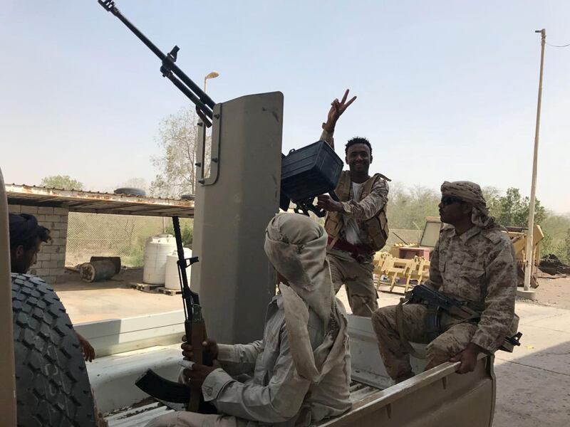 UAE-backed Yemeni soldiers ride on the back of a military patrol vehicle in the Red Sea port city of al-Mokha, Yemen March 5, 2018. REUTERS/Aziz El Yaakoubi