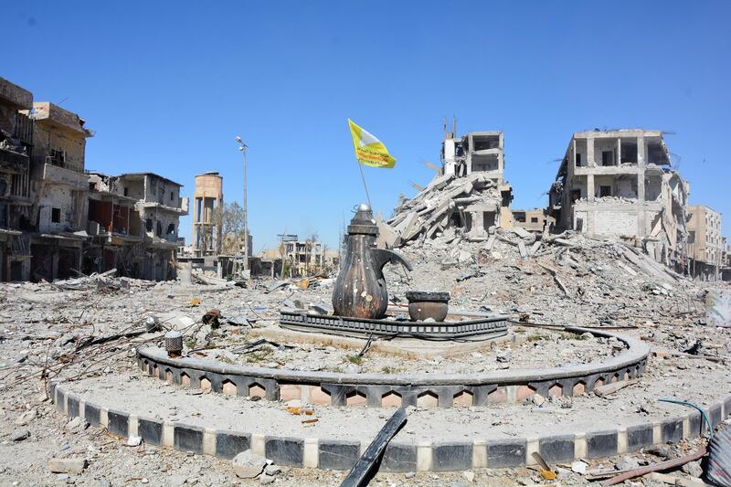 epaselect epa06274744 A view of the Al-Na'im roundabout after its liberation in central Al-Raqqa, Syria, 18 October 2017 (issued 19 October 2017). The Al-Na'im roundabout also known as the 'Roundabout of Hell', located in the center of the city of Al-Raqqa, has been the last to be liberated by US backed Syrian forces from the grip of the organization of the so-called Islamic State (IS, ISIS or ISIL). The roundabout was used by ISIS extremists to perform public executions, beheadings and crucifixions during their three-year rule of the city.  EPA/YOUSSEF RABIH YOUSSEF
