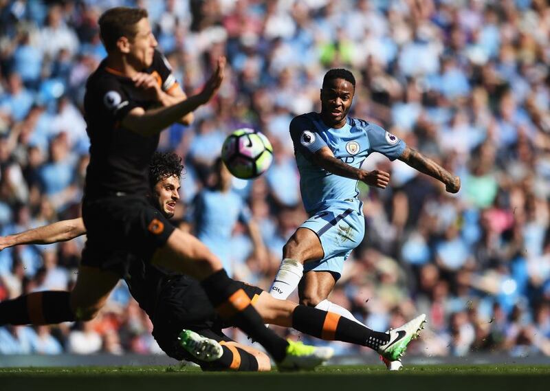 Raheem Sterling of Manchester City shoots. Shaun Botterill / Getty Images
