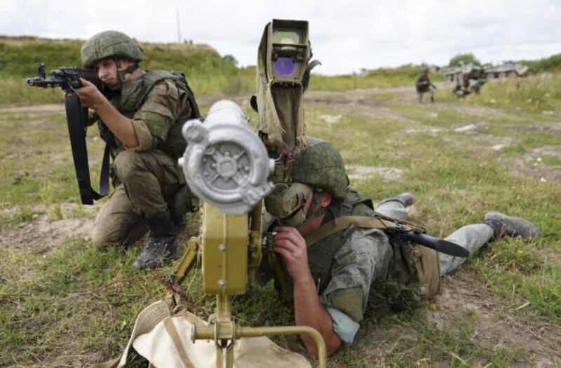 Russian servicemen operate an anti-tank guided missile launcher during exercises in Khmelyovka. Getty