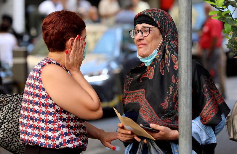 A woman reacts outside American University of Beirut medical centre in Beirut, Lebanon. Reuters