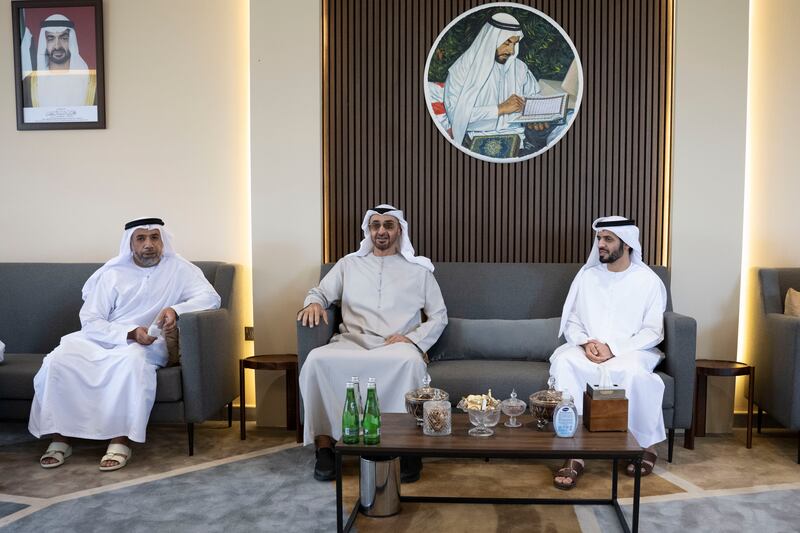 Sheikh Mohamed bin Zayed, Crown Prince of Abu Dhabi and Deputy Supreme Commander of the Armed Forces (C), visits the home of Dr Omar Habtoor Al Derei, Director General of the UAE Fatwa Council (R). Seen with Hamad Habtoor Al Derei (L).