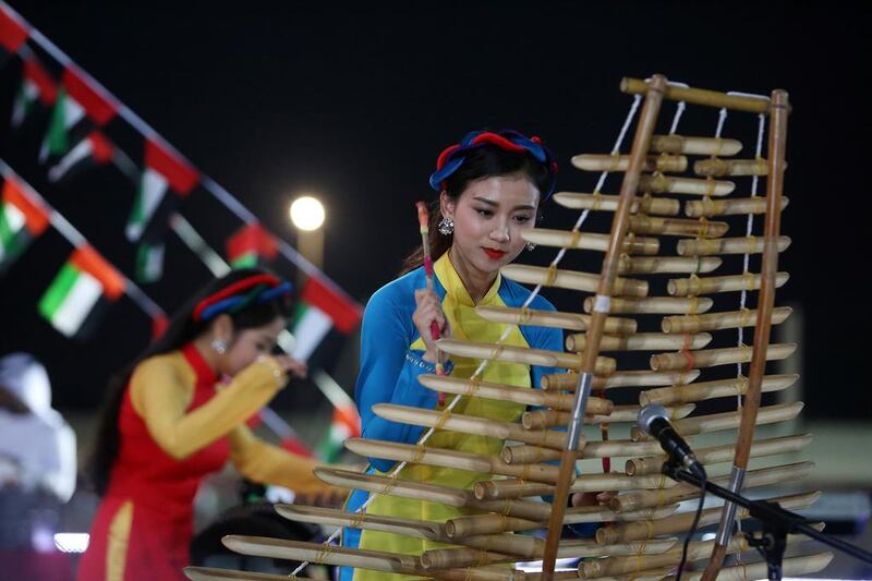 Artists from Vietnam perform during the UAE 45th National Day celebration held at Ministry of Culture and Knowledge Development Centre in Fujairah.  Pawan Singh / The National