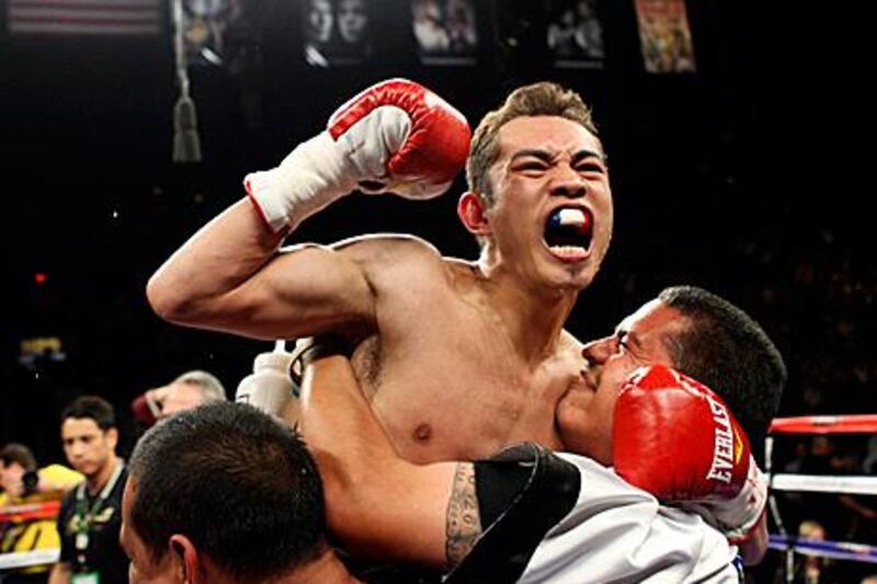 Nonito Donaire of the Philippines celebrates his victory over WBC/WBO bantamweight champion Fernando Montiel of Mexico at the Mandalay Bay Events Center in Las Vegas, Nevada.