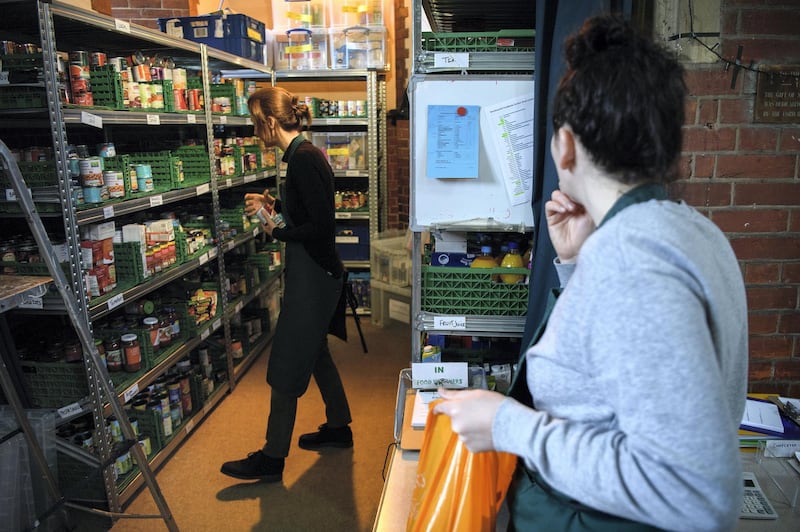 LONDON, ENGLAND - MAY 05:  Volunteers at Wandsworth foodbank prepare food parcels for guests from their stores of donated food, toiletries and other items on May 5, 2017 in London, England.  The Trussell Trust, who run the food bank, report that dependency on their service is continuing to rise, with over 1,182,000 three day emergency food supplies given to people in crisis in the past year. 436,000 of these recipients were children.  (Photo by Leon Neal/Getty Images)