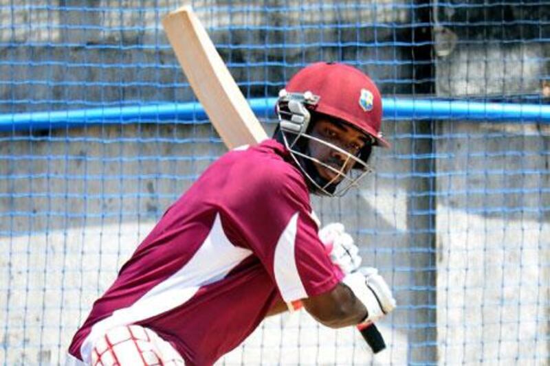 West Indies batsman Darren Bravo exhibits the exaggerated back lift, which has earned comparisons with Brian Lara, his famous cousin, during a net session in Chennai yesterday. Prakash Singh / AFP