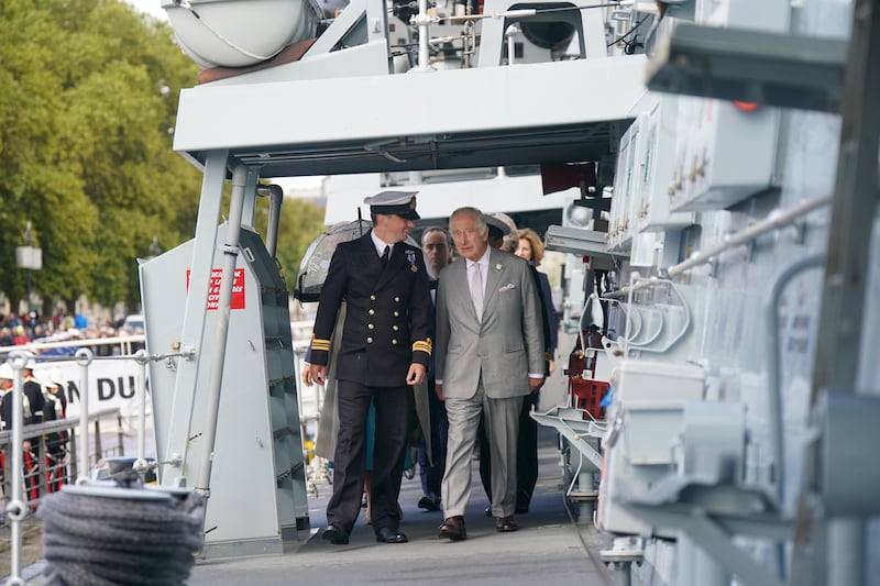 King Charles arrives to for a reception on the flight deck of HMS Iron Duke in Bordeaux. PA