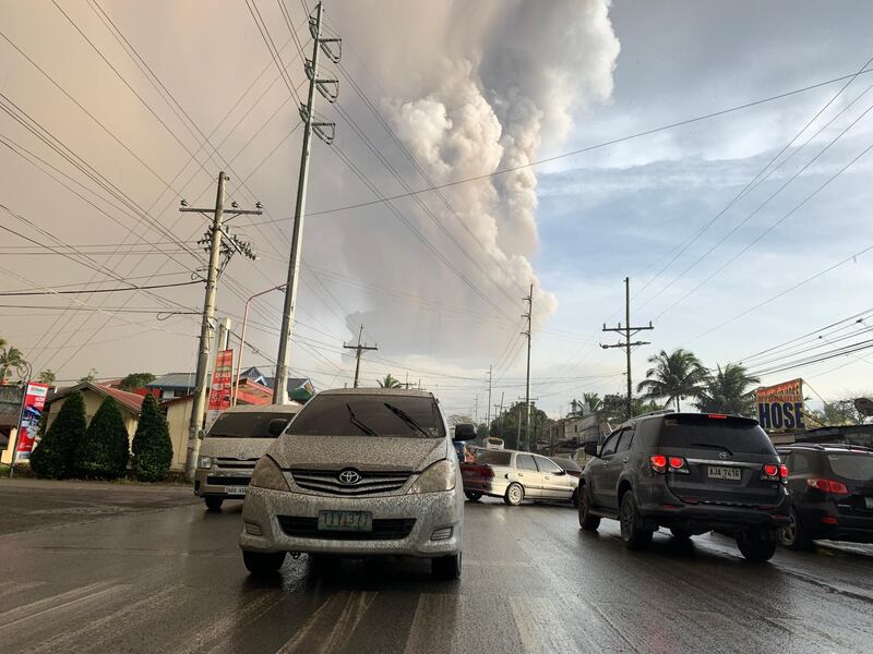 An ash column from Taal Volcano looms over Tagaytay city, Philippines. EPA