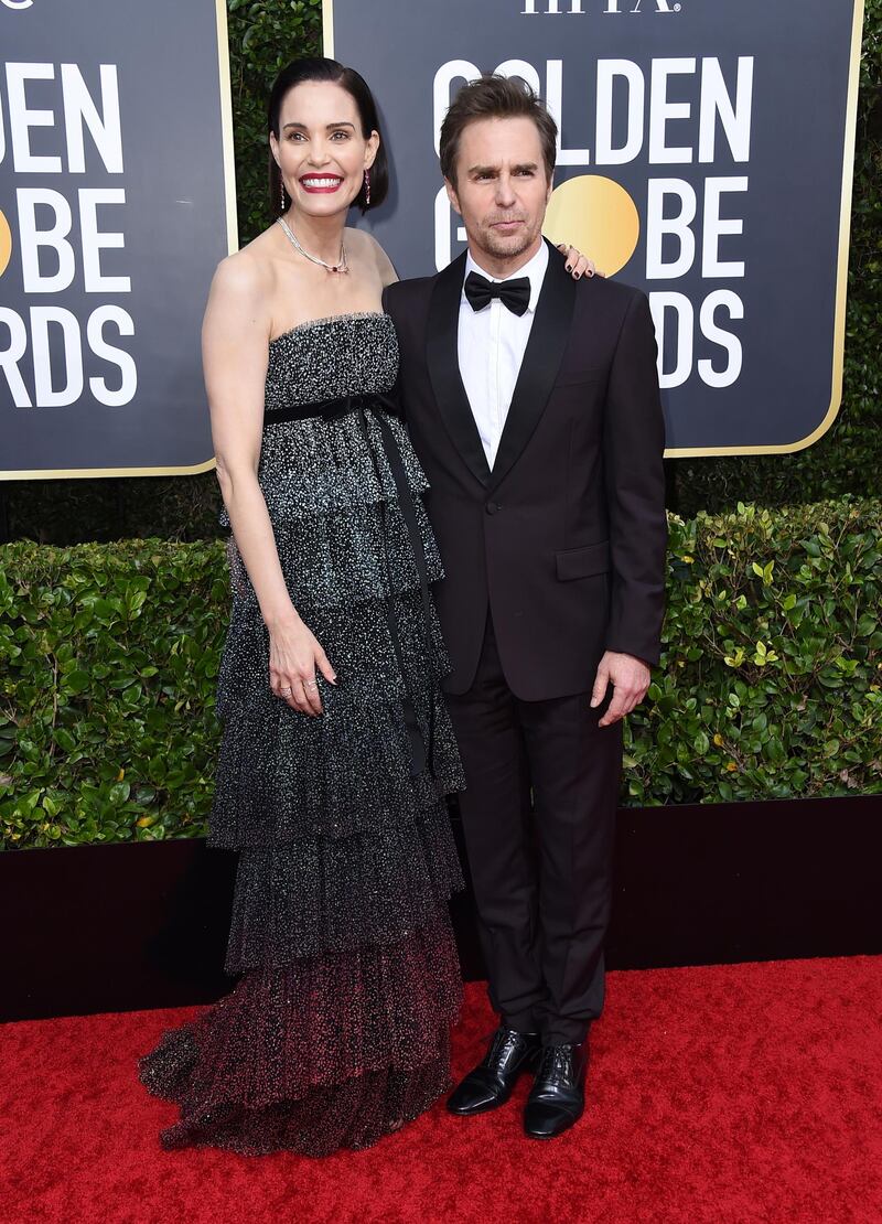 Leslie Bibb, left, and Sam Rockwell, wearing Prada, arrive at the 77th annual Golden Globe Awards at the Beverly Hilton Hotel on January 5, 2020. AP